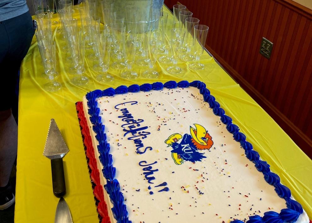 Cake and drinks for John Gluckman's Promotion Celebration