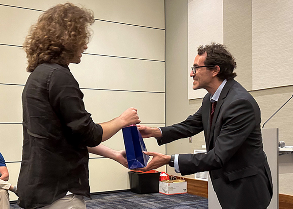 Toma Dimitiru, B.A. receives graduation gift from Prof. & DUS Fiorentino