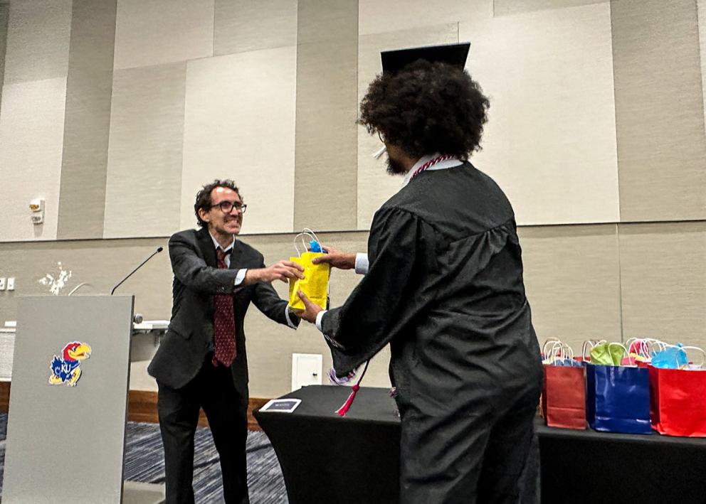 Michael Tate, B.A. Receives Graduation Gift from Prof. & DUS Fiorentino